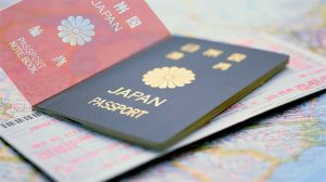Japanese Passport, Airplane Ticket and a Map